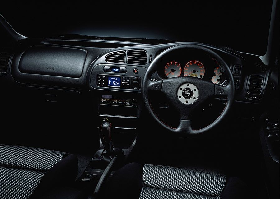 Subaru Impreza 2.0 GT Turbo (19942000) vs. Mitsubishi