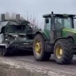 Ukraiński rolnik holujący czołg